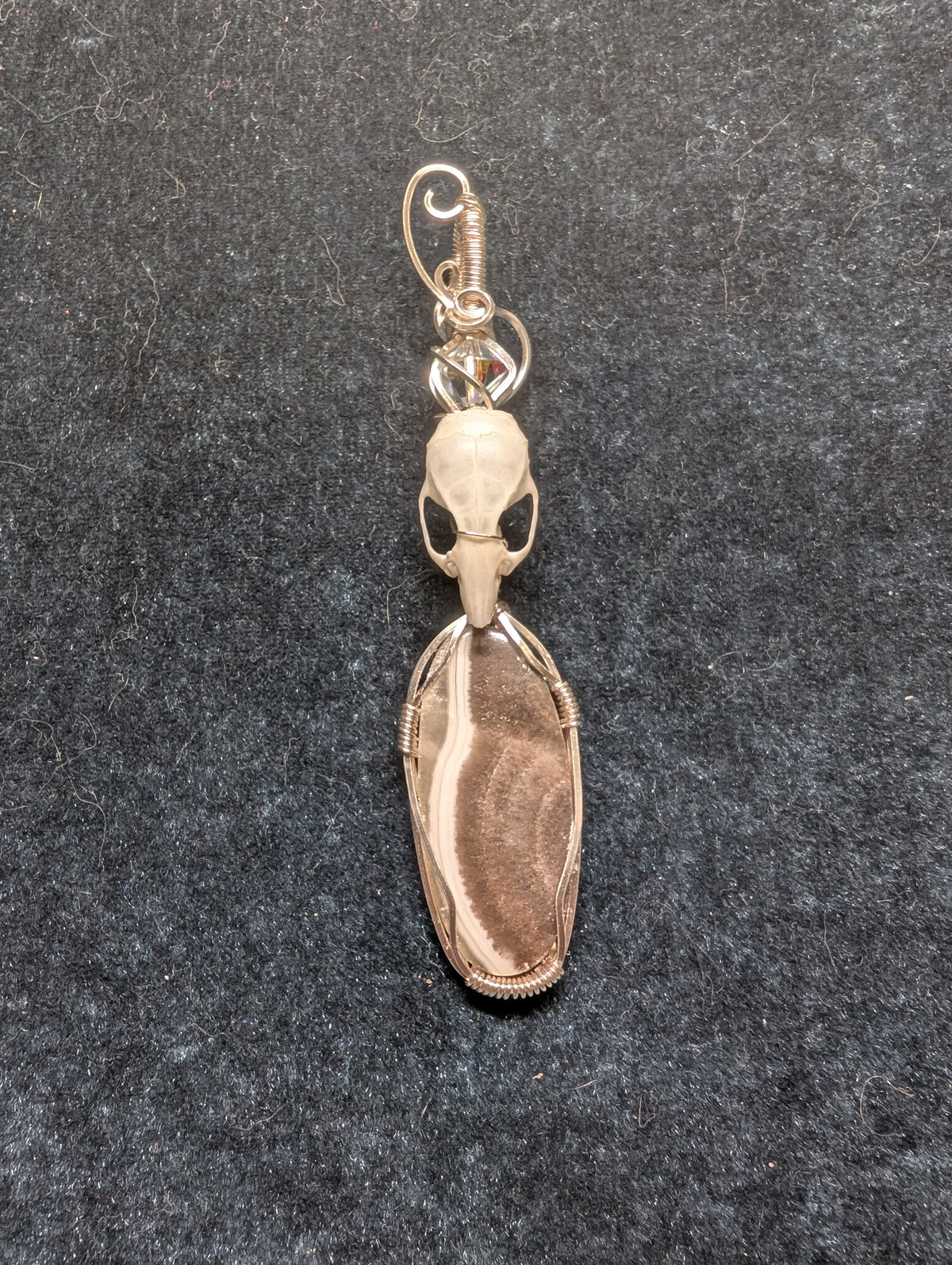 Zebra Palm Calcite and Mouse Skull Wire Wrapped Pendant