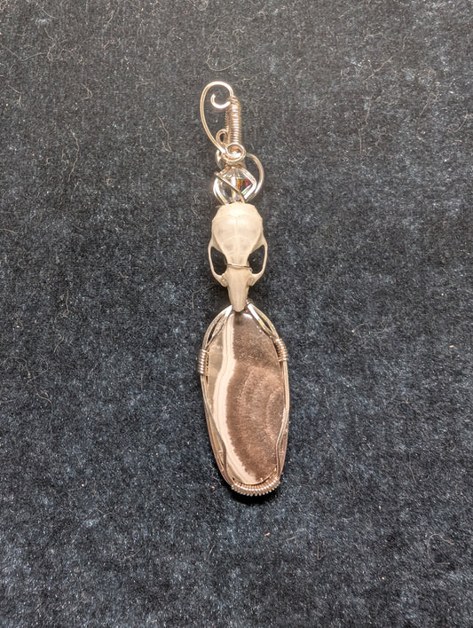 Zebra Palm Calcite and Mouse Skull Wire Wrapped Pendant